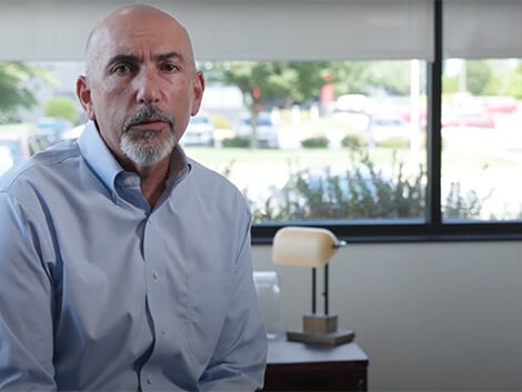 Doctor Hammerman, sitting and speaking to the camera about Select Medical's 5 whys.
